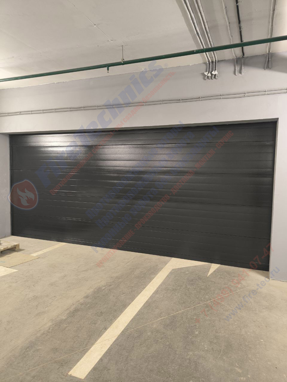 Секционные противопожарные ворота FireTechnics-S EI60 в паркинге ЖК